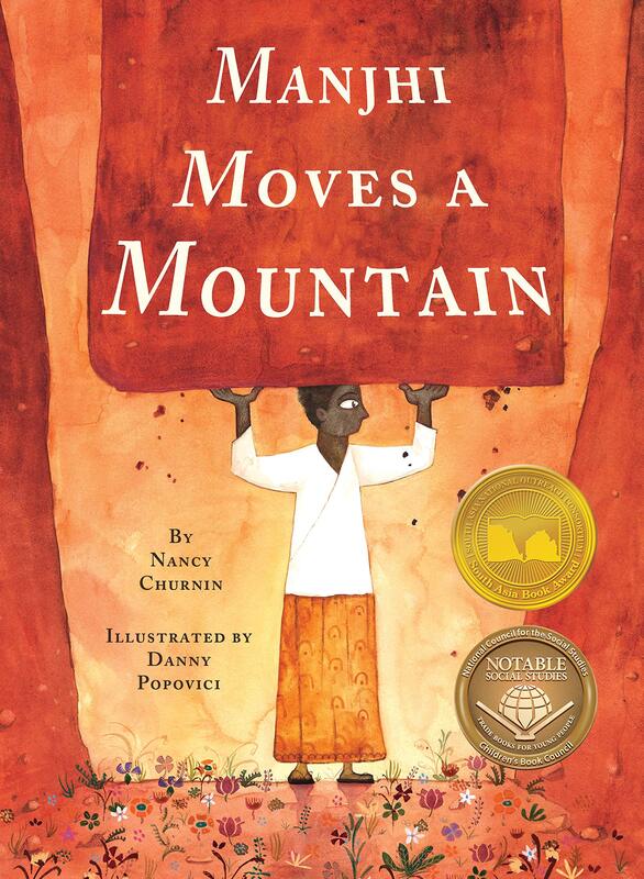 A color image of the children's book: Manjhi Moves a Mountain by Nancy Churnin