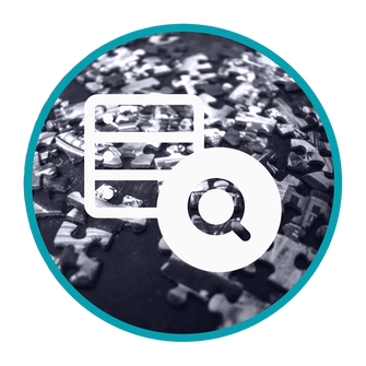 A black and white image of a pile of puzzle pieces with a magnifying glass representing our research approach to problems.  