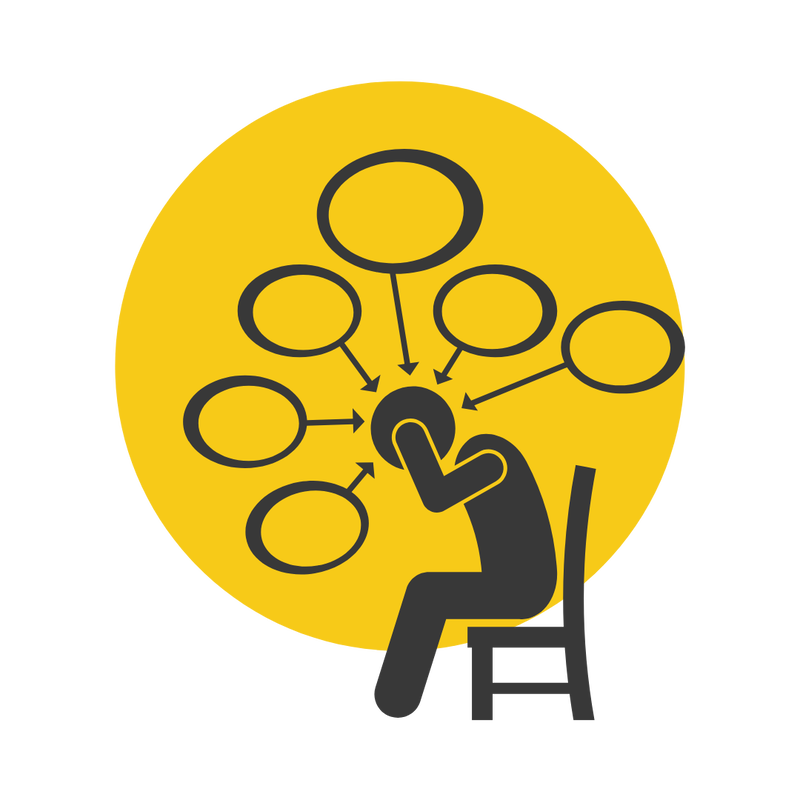 An icon of a person sitting in a chair with many small text bubbles above them symbolizing tasks or people. The icon symbolizes stress and anxiety. 